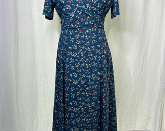 Vestido vintage de los años 90 con estampado calico: estilo cottagecore, manga corta, escote cruzado. Talla 8.