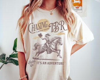 Bookish Cowgirl Shirt, Cowboy Romance Era Shirt, Western Cowgirl Chasing My TBR List Shirt, Vintage Cowgirl Book Lover Shirt, Saddle Up Tee