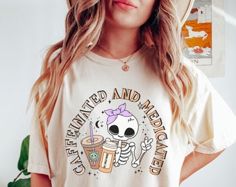 Halloween Mental Health Shirt, Caffeinated and Medicated Shirt Comfort Colors® Skeleton Iced Coffee Shirt Take Your Meds Shirt Anxiety Shirt