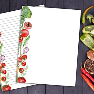 May include: A printable lined paper with a watercolor border of tomatoes, onions, and other vegetables. The paper is white with black lines.