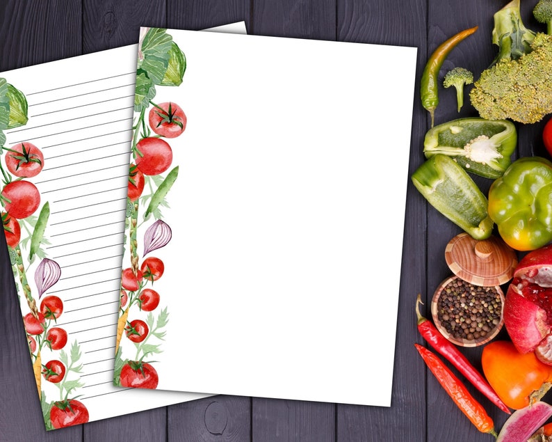 May include: A printable lined paper with a watercolor border of tomatoes, onions, and other vegetables. The paper is white with black lines.