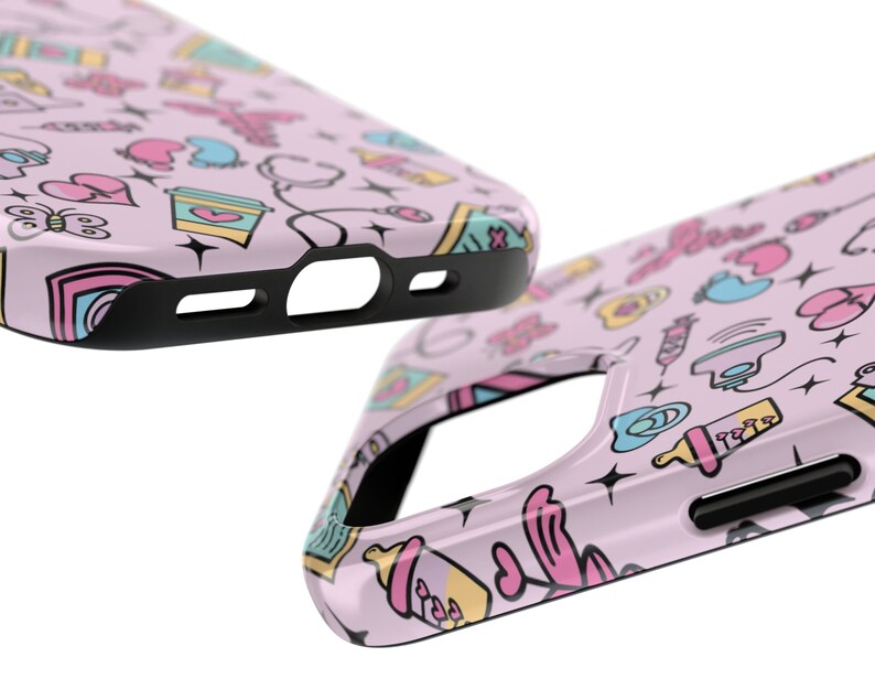 May include: A pink phone case with a colorful pattern of baby-related icons, including a bottle, a pacifier, and a rattle. The case has a black bumper and cutouts for the camera and buttons.