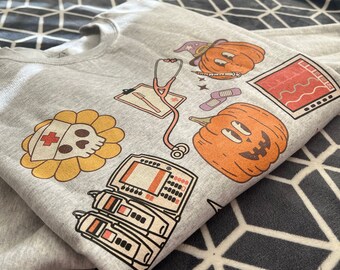 Halloween Nurse Sweatshirt, Medical Halloween Sweatshirt, ER Nurse Crewneck Sweatshirt, Telemetry Nurse Sweatshirt, Emergency Squad Sweater