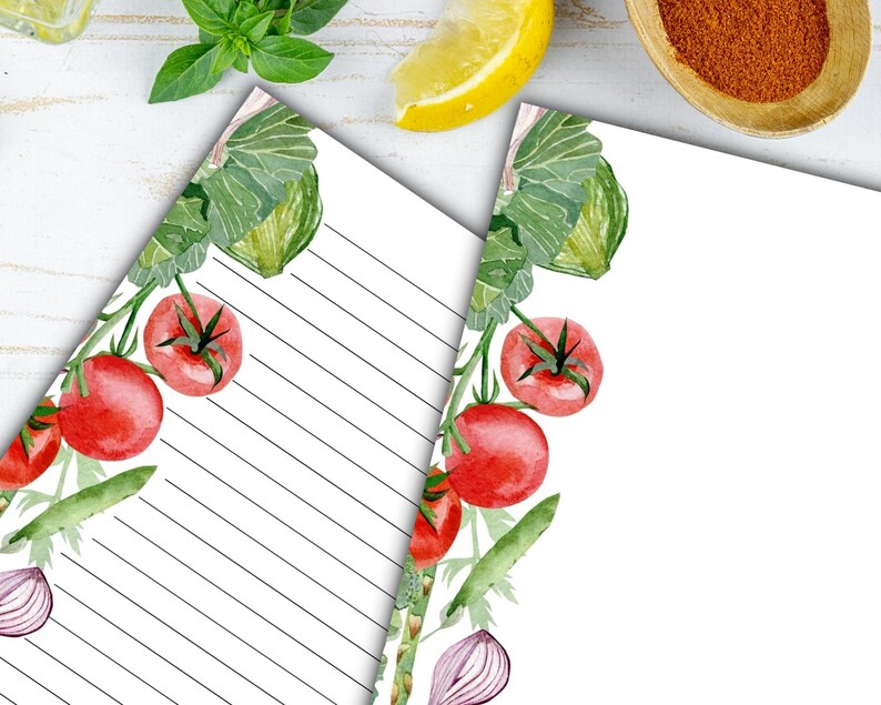 May include: Two printable sheets of lined paper with a watercolor border of tomatoes, onions, and green leaves. The border is on the left side of each sheet.
