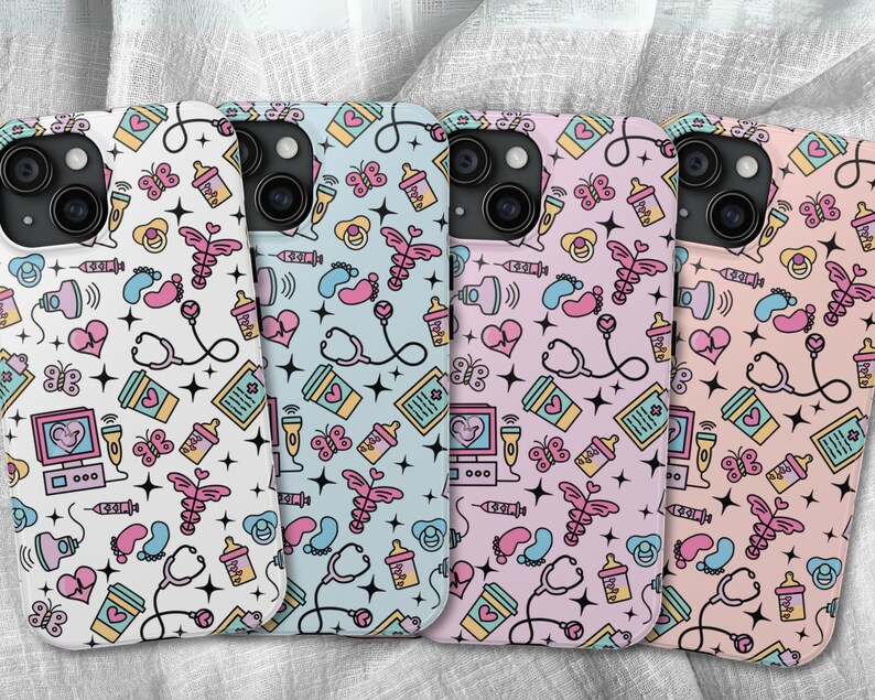 May include: Four phone cases with a cute baby-themed design. The cases are pink, blue, white, and light pink with a variety of baby-related icons, including a stethoscope, a baby bottle, a pacifier, and a footprint.