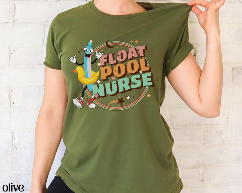 May include: Olive green t-shirt featuring a cartoon illustration of a pool float and the text "FLOAT POOL NURSE".