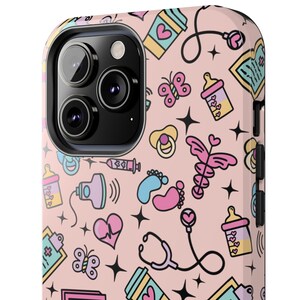 May include: A pink iPhone case with a cute baby-themed design. The case features a variety of icons, including a stethoscope, a baby bottle, a pacifier, and a footprint. The case is made of durable plastic and has a raised lip to protect the screen.
