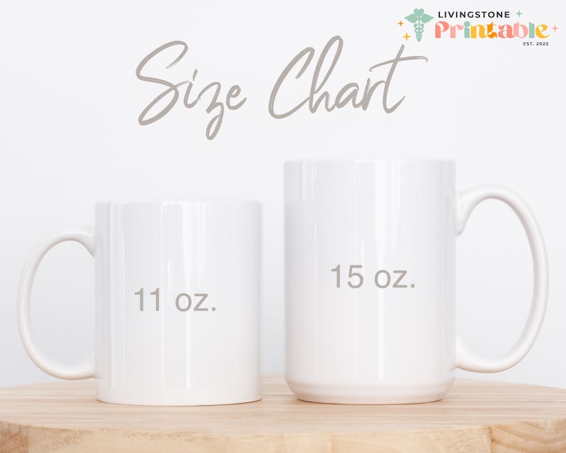 May include: Two white ceramic mugs, one 11 oz and one 15 oz, on a wooden surface. The mugs are blank and ready for personalisation.