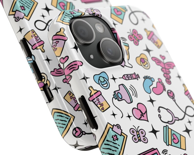 May include: White iPhone case with a colorful pattern of baby-related icons, including pacifiers, bottles, footprints, and a stethoscope. The case has a black camera cutout.