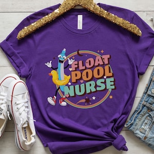 May include: Purple t-shirt featuring a cartoon illustration of a pool float and the text "Float Pool Nurse".