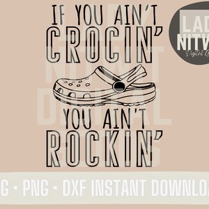 May include: Black and white line art design of a clog shoe with the text "If you ain't crocin' you ain't rockin'" and the logo "Lady Nitwit Digital Goods".