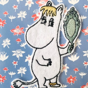 BIGLIETTO D'AUGURI piegato Moomin Snorkmaiden con specchio, toppa cucita