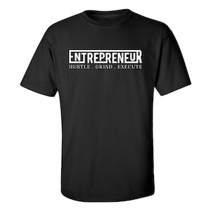 May include: Black t-shirt with white text that reads "ENTREPRENEUR" and "HUSTLE. GRIND. EXECUTE."