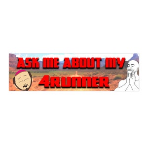 May include: Rectangular bumper sticker with the text "ASK ME ABOUT MY 4RUNNER" in red block letters. The background features a desert landscape. Cartoon images of a man with a beard and a bald man are on either side of the text.