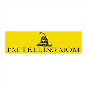 May include: A yellow banner featuring a black and green snake coiled around a stick. The banner displays the text "I'M TELLING MOM" in black.
