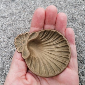 Sea shell footed brass dish. Vintage brass sea shell footed bowl. Vintage brass offering dish.