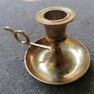 Small taper candle holder with round drip tray. Vintage brass candlestick for one taper candle.