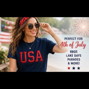 May include: A woman wearing a navy blue t-shirt with the word "USA" in red, a red bandana, and sunglasses. The image includes text that says "Perfect for 4th of July" and lists BBQs, Lake Days, Parades & More!