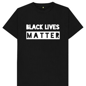 May include: Black t-shirt with the words "Black Lives Matter" printed in white.
