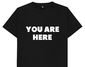 May include: Black t-shirt with white text that reads "YOU ARE HERE".