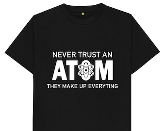 May include: Black t-shirt with white text that reads "Never trust an atom, they make up everything". The text is accompanied by a white graphic of an atom.