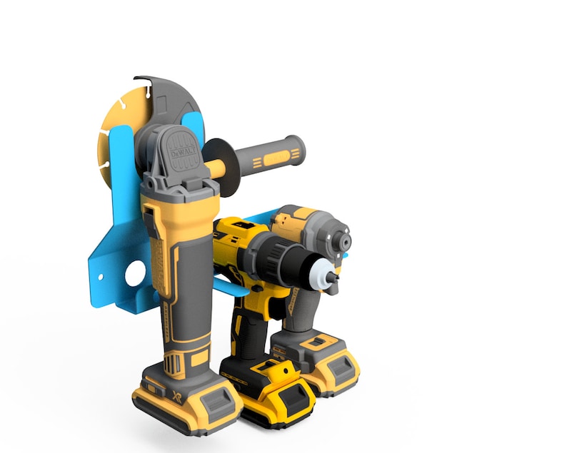 May include: A blue wall mount with three power tools: a yellow and black angle grinder, a yellow and black drill, and a yellow and black impact driver.