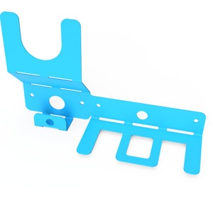 May include: A light blue metal wall mount with four hooks and a small shelf. The shelf has a curved lip to hold items in place.