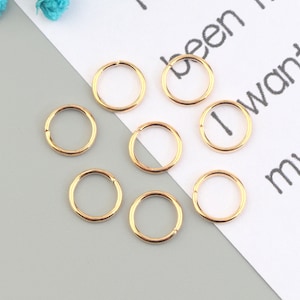 50PCS 0.9mm * 8mm gold-plated jump ring, gold-plated open jump ring, used for jewelry processing and jewelry accessories SE0077