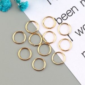 50PCS 0.7mm *7mm gold-plated jump ring, gold-plated open jump ring, used for jewelry processing and jewelry accessories SE0098