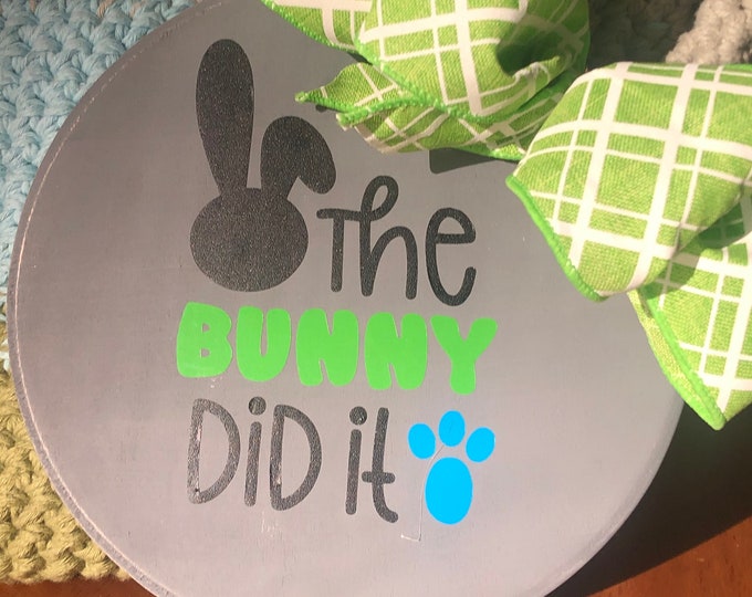 The Bunny Did It Cute Easter Sign | funny Easter bunny sign with green word bunny and blue bunny print is a bright colorful Easter sign