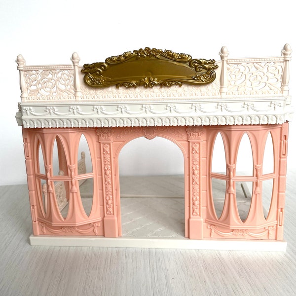 Calico Critters small elegant building with Gold sign and peach coral walls