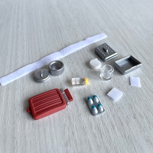 miniature medical equipment, Hot water bottle replacement, medicine, & bandages.  hospital accessories, spare parts, country clinic hospital