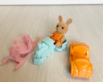 Vehículo para bebé Calico Critters: elige entre mecedora, tren o coche