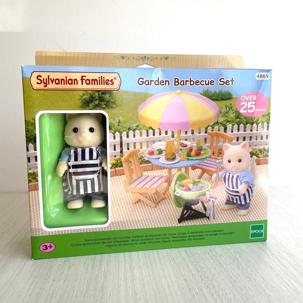 Sylvanian Families Garden Barbecue set, new in unopened box.  Chantilly Cat dad with striped blue apron and green barbecue & patio furniture