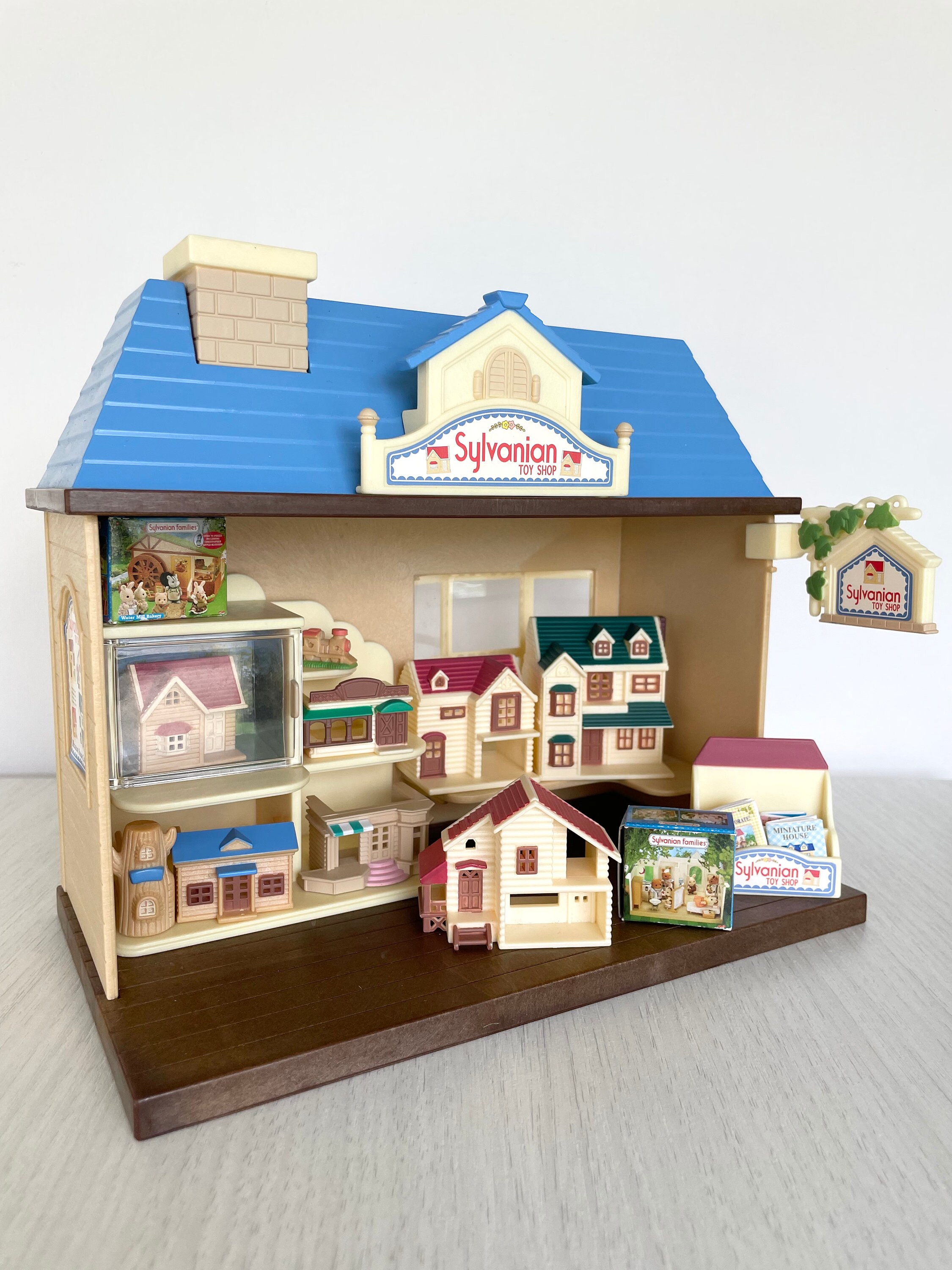 Calico Critters miniature houses vintage toy shop like new complete and with box Sylvanian Toy Shop mini house shop with tiny dollhouses