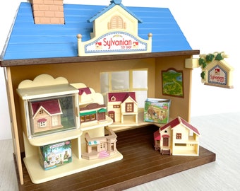 Calico Critters miniature houses vintage toy shop in good condition, not complete. Sylvanian Toy Shop mini house shop with tiny dollhouses