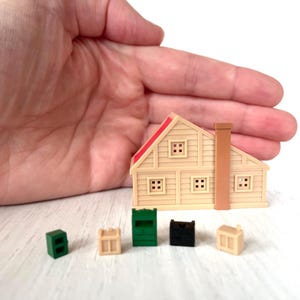 Sylvanian Families mini dollhouse with tiny furniture, vintage discontinued set for retro toy collectors, in excellent condition
