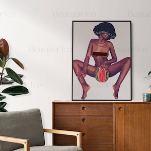 May include: A framed illustration of a woman with an afro hairstyle holding a watermelon. The woman is nude and sitting with her legs spread. The background is a light gray color.