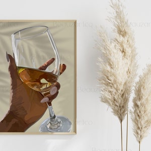 May include: A hand holding a glass of wine. The glass is filled with a golden liquid and the hand is brown. The background is a light beige color.