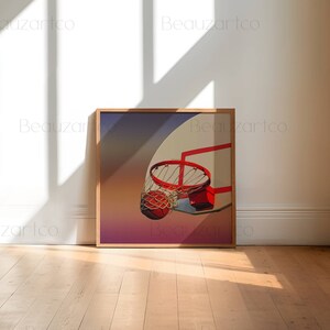 May include: A framed print of a basketball going through a hoop. The background is a gradient of purple, pink, and orange.