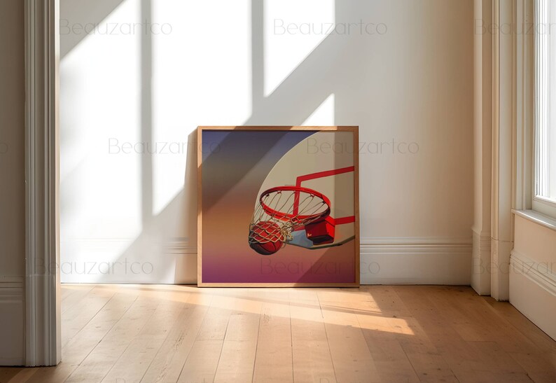 May include: A framed print of a basketball going through a hoop. The background is a gradient of purple, pink, and orange.