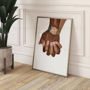 May include: Two hands holding each other, one hand is wearing a gold watch with a black band.