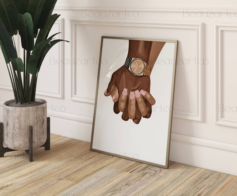 May include: Two hands holding each other, one hand is wearing a gold watch with a black band.