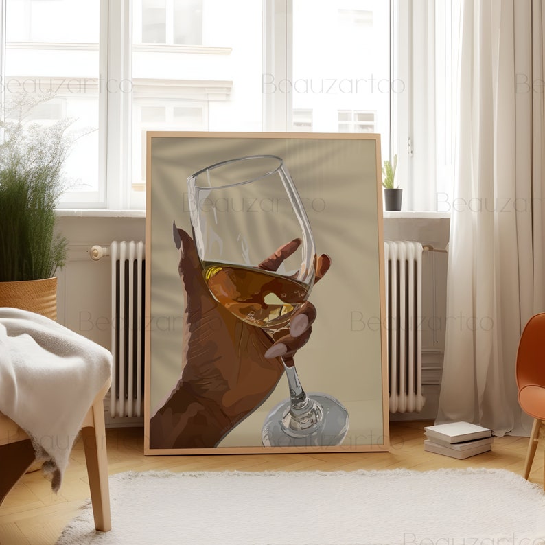 May include: A hand holding a glass of white wine. The glass is clear and has a long stem. The hand is brown and has long, painted nails.
