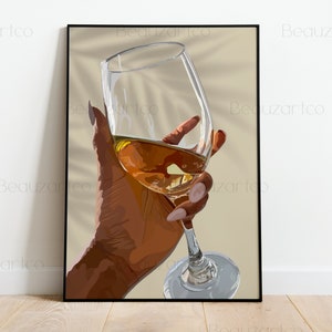 May include: A hand holding a glass of amber-colored liquid. The glass is clear and has a long stem. The hand is brown and has long, manicured nails.