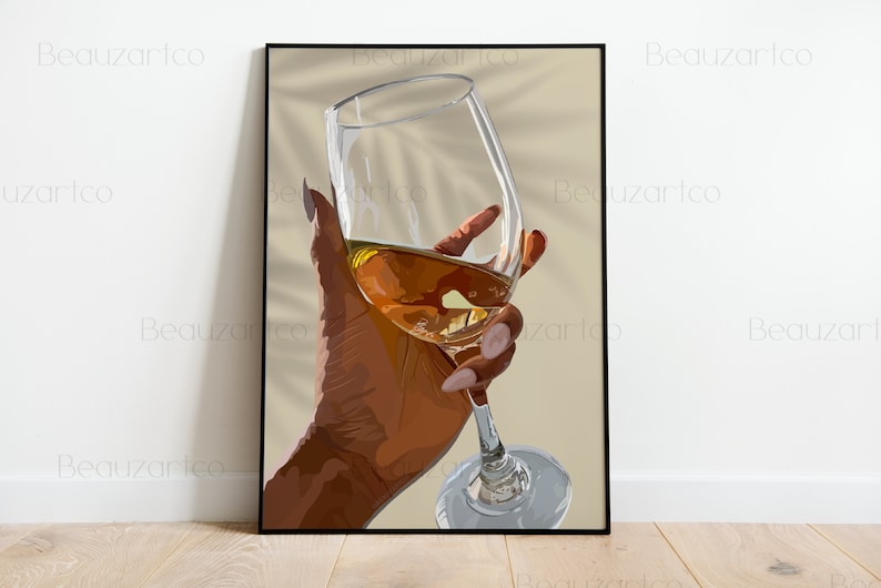 May include: A hand holding a glass of amber-colored liquid. The glass is clear and has a long stem. The hand is brown and has long, manicured nails.