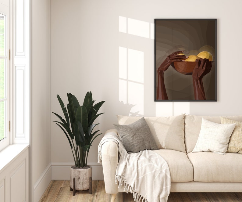 May include: A framed illustration of two brown hands holding a bowl filled with yellow fruit. The background is a dark brown color.