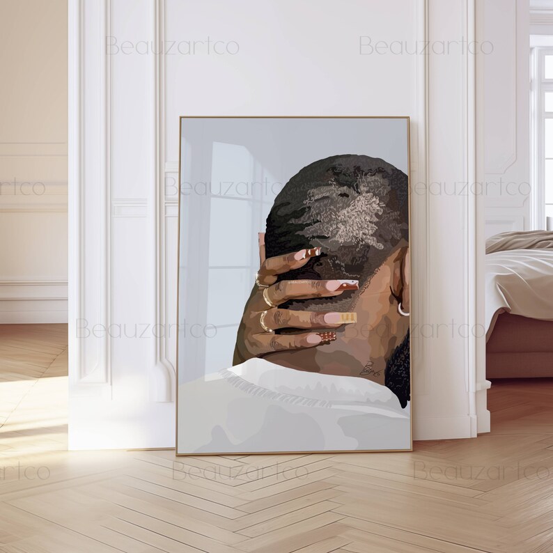 May include: A close-up of a person's back with their hand resting on their head. The person has short, dark hair and is wearing a white shirt. Their nails are painted with a light brown color and have gold accents.