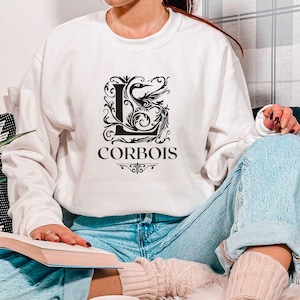 Luther Corbois-sweater: Spark of the Everflame ronde hals IK HEB OFFICIEEL IN LICENTIE GELEVERD voor boekmerchandise voor The Kindred&#39;s Curse Saga door Penn Cole