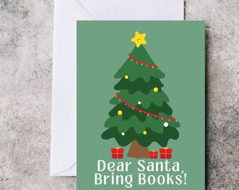 May include: A Christmas greeting card with a green background, a cartoon Christmas tree, and the text "Dear Santa, Bring Books!". The tree has yellow ornaments, a red garland, and a yellow star on top. Two small red gift boxes are at the base of the tree.